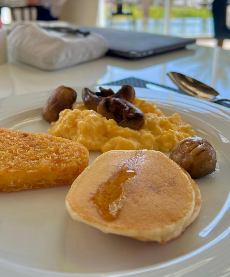 Royal M Al Aqah Beach Resort By Gewan 외부 사진 A plate of scrambled eggs with mushrooms and a pancake